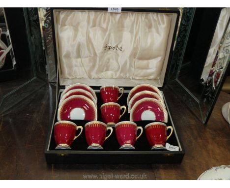 A cased Spode six setting Coffee set in 'Ryde' pattern, ruby ground with gilt detail