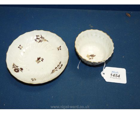 A Royal Worcester Flight Barr &amp; Barr tea bowl and saucer, some wearing to the gold coloured rim and firing marks to sauce