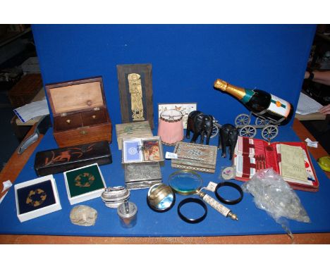 A quantity of miscellanea including wooden tea caddy (foot missing), a cased Bridge set, place mats, boxed playing cards, lar