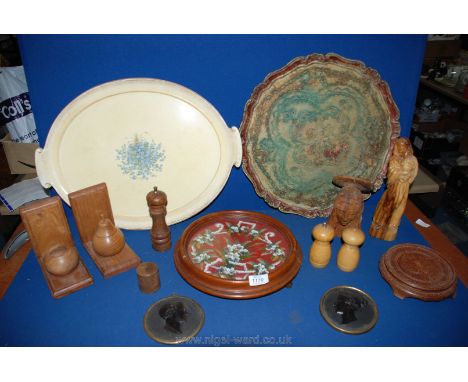 A quantity of miscellanea to include two old trays, wooden bookends, condiment set, carved figure 'Mary and Jesus', and a tap