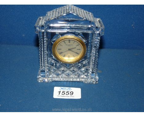 A Waterford Crystal quartz clock 4 3/4" high x 3 1/2" wide.