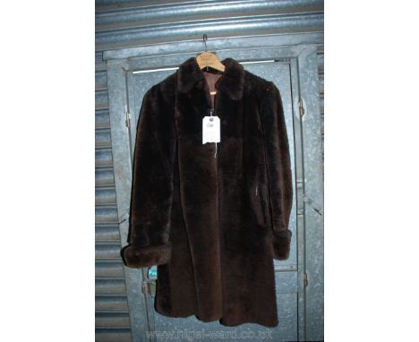 A beaverskin fur three quarter length coat by Baronfur Model.