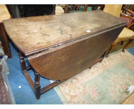 An 18th c. design gate leg, drop leaf Dining Table, 55'' x 17 3/8'' extending to an oval 63'', 29 3/8'' high approx and havin