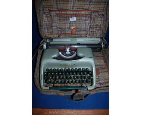 A portable Voss ST32 Typewriter, green, cased