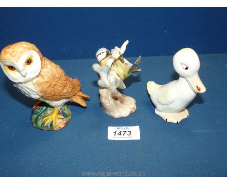 A Beswick owl and duck and a Goebel blue tit on branch.