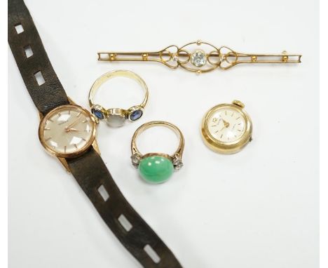 An Edwardian 15ct, aquamarine and diamond set three stone bar brooch, 74mm, a lady's yellow metal Omega manual wind wrist wat