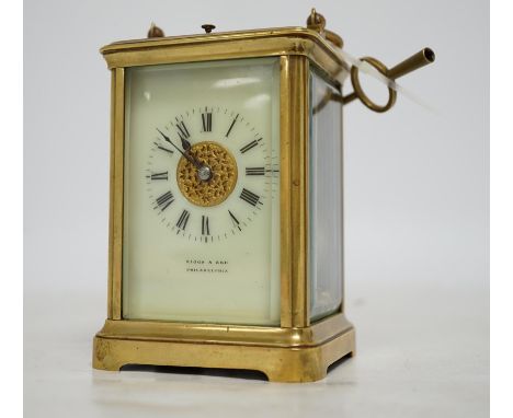 A brass cased repeating carriage clock with key, 14cm. Condition - good, currently ticking