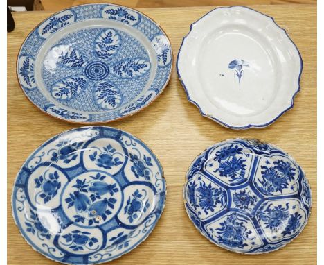 Four various continental delftware dishes, 18th and 19th century, largest 31cm diameter. Condition - various cracks and chipp
