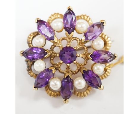 A 1970's 9ct gold, amethyst and cultured pearl cluster set circular brooch, 28mm, gross weight 7.1 grams. Condition - fair to