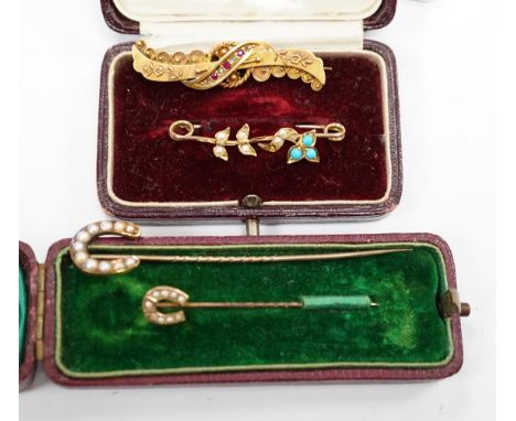 A late Victorian 15ct gold, ruby and diamond chip set bar brooch, 39mm, a yellow metal, seed pearl and turquoise set bar broo