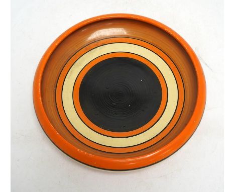 A Clarice Cliff Fantasque shallow dish, 24cm in diameter. Condition - fair Small flake to the black enamel at centre; other m