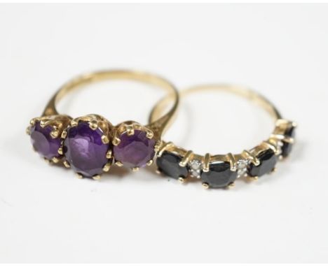 Two modern 9ct gold and gem set rings including three stone amethyst, size O and sapphire and diamond chip half hoop, gross w