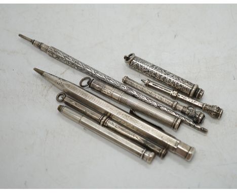 An engine turned silver cased Yard-O-Led pencil,  three silver cased propelling pencils, a sterling cased propelling pencil a