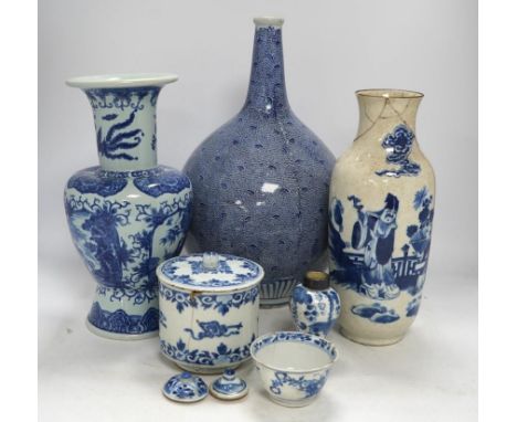 Four Chinese blue and white vases, a jar and cover and a tea bowl, Kangxi to 20th century, tallest vase 38cm high. Condition 