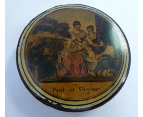 An early 19thC round, shallow, black lacquered papier mache snuff box, the cover featuring a scene entitled 'Paul et Virginie