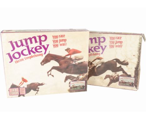 A pair of Tri-ang Jump Jockey Sets, JJ200, comprising two Horses, instructions, track, Gate and Controllers (box lid poor) an