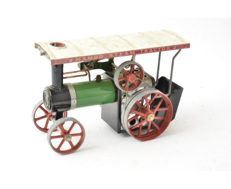 A Mamod TE 1a Spirit-fired Steam Tractor, with reversing engine, lever-operated whistle, level plug, drive belt, canopy, scut