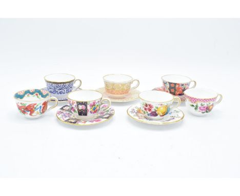 Royal Worcester Miniature Cups and Saucers: Cut Fruit white, George III, Boldimars, Strings of Flowers, Royal Lily with 2 spa