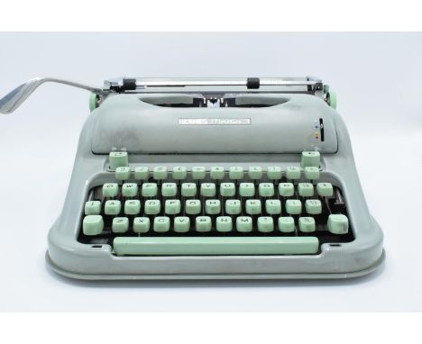 Hermes Media 3 typewriter in case. Untested. Assumed spares/repairs. Some paint loss to the exterior case. 