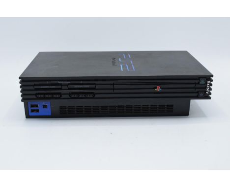 Playstation 2 console together with a quantity of PS1 and PS2 games and a box wires/ controllers. There are also some videos,