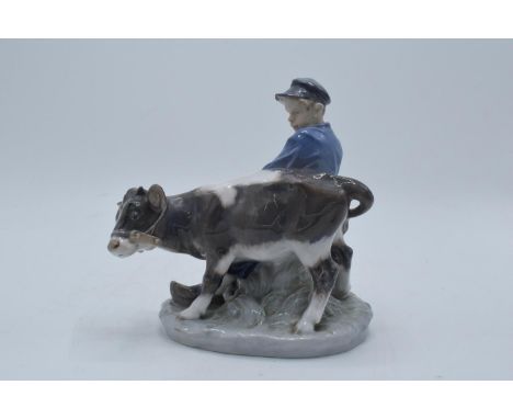 Royal Copenhagen figure Boy with Calf 772. In good condition with no obvious damage or restoration. 17cm tall 