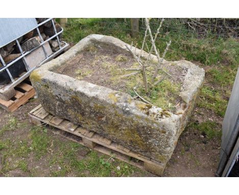 A 19th century sandstone trough / planter. max dimensions are approximately 114 x 79 x 43cm. There is a crack down one side b