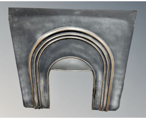 A cast iron fire surround, together with a fire grate 