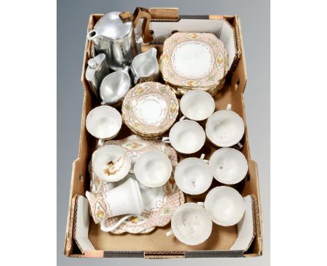 A box of three-piece Picquot ware tea service, hip flask, together with a quantity of Wembley bone tea china 