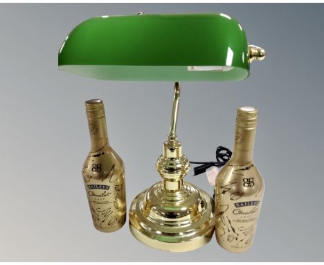 A reproduction brass banker's lamp (height 38cm), together with two bottles of Baileys Chocolate Irish cream liqueur.
