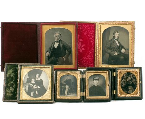 Two cased quarter plate Ambrotype portraits of Gentlemen, each with subtle hand tinting (condition 5); a smaller mother and c