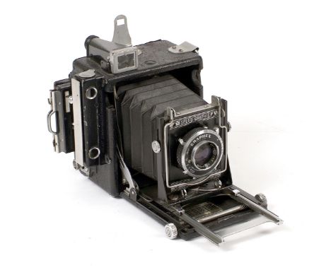 Graphex Speed Graphic 2 1/4 x 3 1/4 Plate Camera. With Optar 101mm f4.5 lens. (Focal plane shutter working, condition 5F). Wi