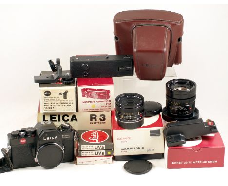 Extensive Leica R3 Electronic Outfit. Comprising R3 Electronic body #150907 (condition 5F) with strap in maker's (scruffy) bo