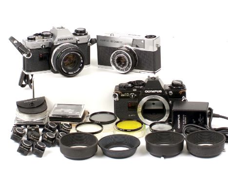 Olympus End Lot to include Quickmatic EEM, an uncommon 126 motor drive camera (motor working),  8 Olympus Manual Adapters for