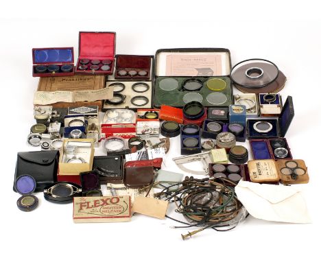 Box of vintage accessories including self timers, close up lenses, filters, etc. Including rare portrait attachments for Coro