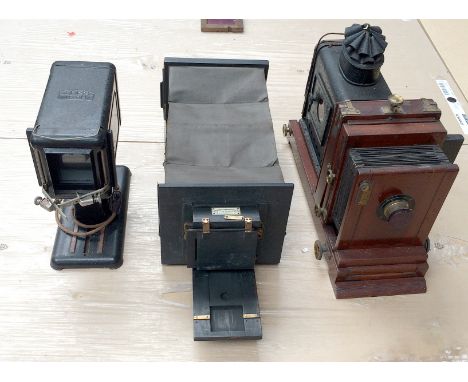 A LARGE horizontal enlarger; London Stereoscopic Company Snapshot Enlarger (circa 1898) a part Zeiss Ikon projector/episcope.