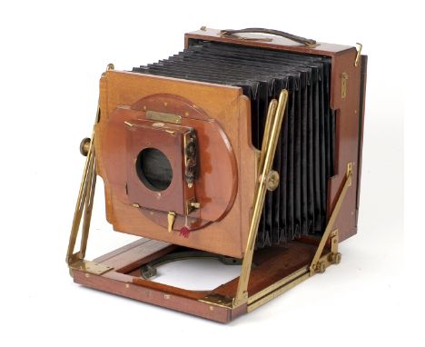 A Good Houghton &amp; Son Whole Plate Field Camera. (condition 4/5F). Lacking lens, fitted with a Thornton Pickard roller bli