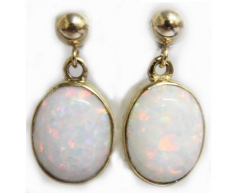 A PAIR OF GILSON OPAL DROP EARRINGS, set in 9ct yellow gold.