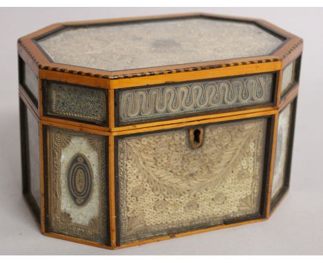 A VERY GOOD GEORGE III ROLLED PAPER OCTAGONAL TEA CADDY with satinwood banding.  7.5ins.