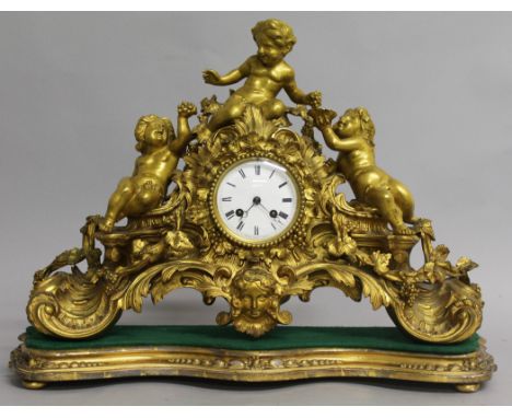 A VERY GOOD 19TH CENTURY FRENCH LOUIS XVI ORMOLU CLOCK with circular white enamel dial, black and white Roman numerals and ei