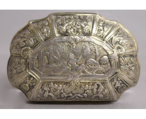 AN 18TH CENTURY CONTINENTAL SILVER SHAPED SNUFF BOX with allover decoration of figures and flowers.  2.75ins long.