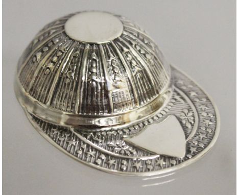 A NOVELTY SILVER JOCKEY CAP TEA CADDY SPOON.