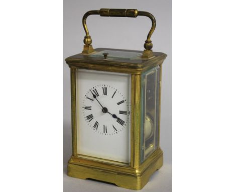 A GOOD 19TH CENTURY FRENCH BRASS REPEATER CARRIAGE CLOCK.  5ins high.