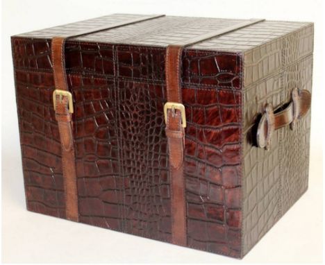 A LEATHER MOCK CROCODILE TRUNK with straps. 1ft 4ins wide.