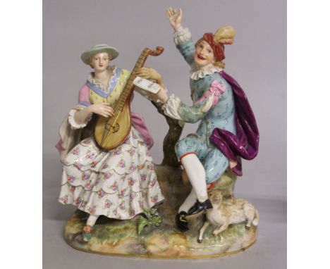 A GOOD LARGE 19TH CENTURY MEISSEN GROUP OF MUSICIANS, the young lady seated playing a lute, the man singing. Cross swords mar