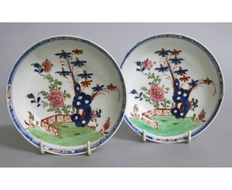 A PAIR OF WORCESTER POLYCHROME SAUCERS.  5ins diameter.