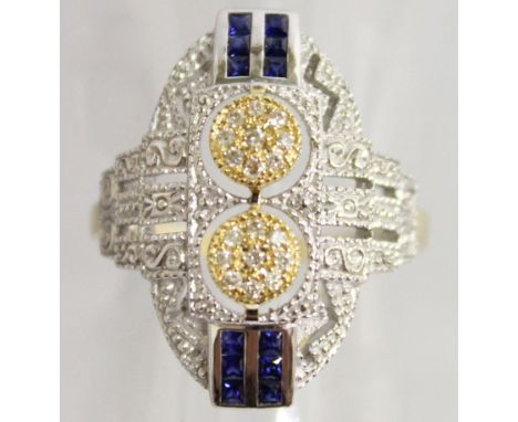 AN 18CT YELLOW GOLD AND SILVER ART DECO DESIGN RING, set with sapphires and diamonds.