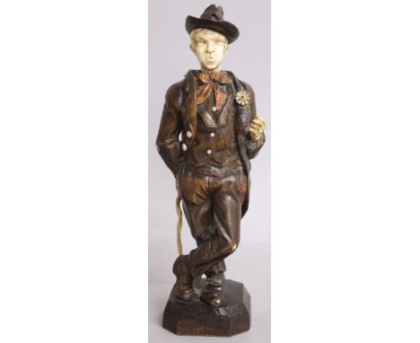 A RARE GERMAN CARVED WOOD AND IVORY AUTOMATON FIGURE with moving ivory head, ivory hands and ivory walking stick, the man als