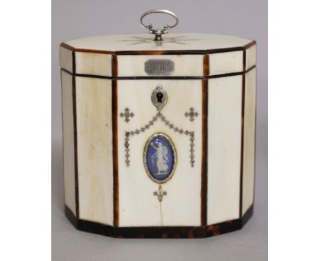 A SUPERB GEORGE III IVORY OCTAGONAL TEA CADDY with tortoiseshell surround and oval Wedgwood plaque. 4ins high.Please note: Jo