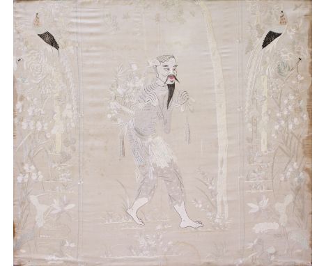 A LARGE CHINESE EMBROIDERED CREAM GROUND SILK PANEL, mounted on board, depicting the Immortal Lan Ts'ai Ho as a bearded man b