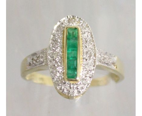 A 9CT YELLOW GOLD CALIBRE CUT EMERALD AND DIAMOND ART DECO DESIGN RING.